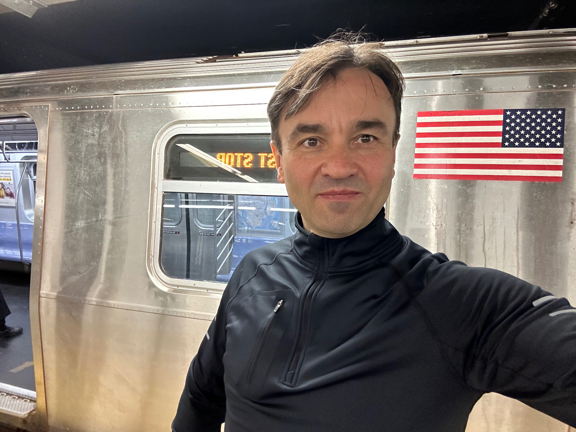 Riding the iconic New York City subway - the silver cars with American flags are a symbol of the city
