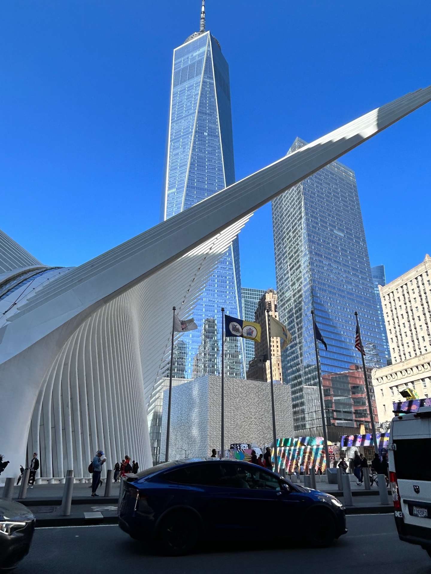 The Oculus and One World Trade Center - Santiago Calatrava's stunning architecture against a blue sky