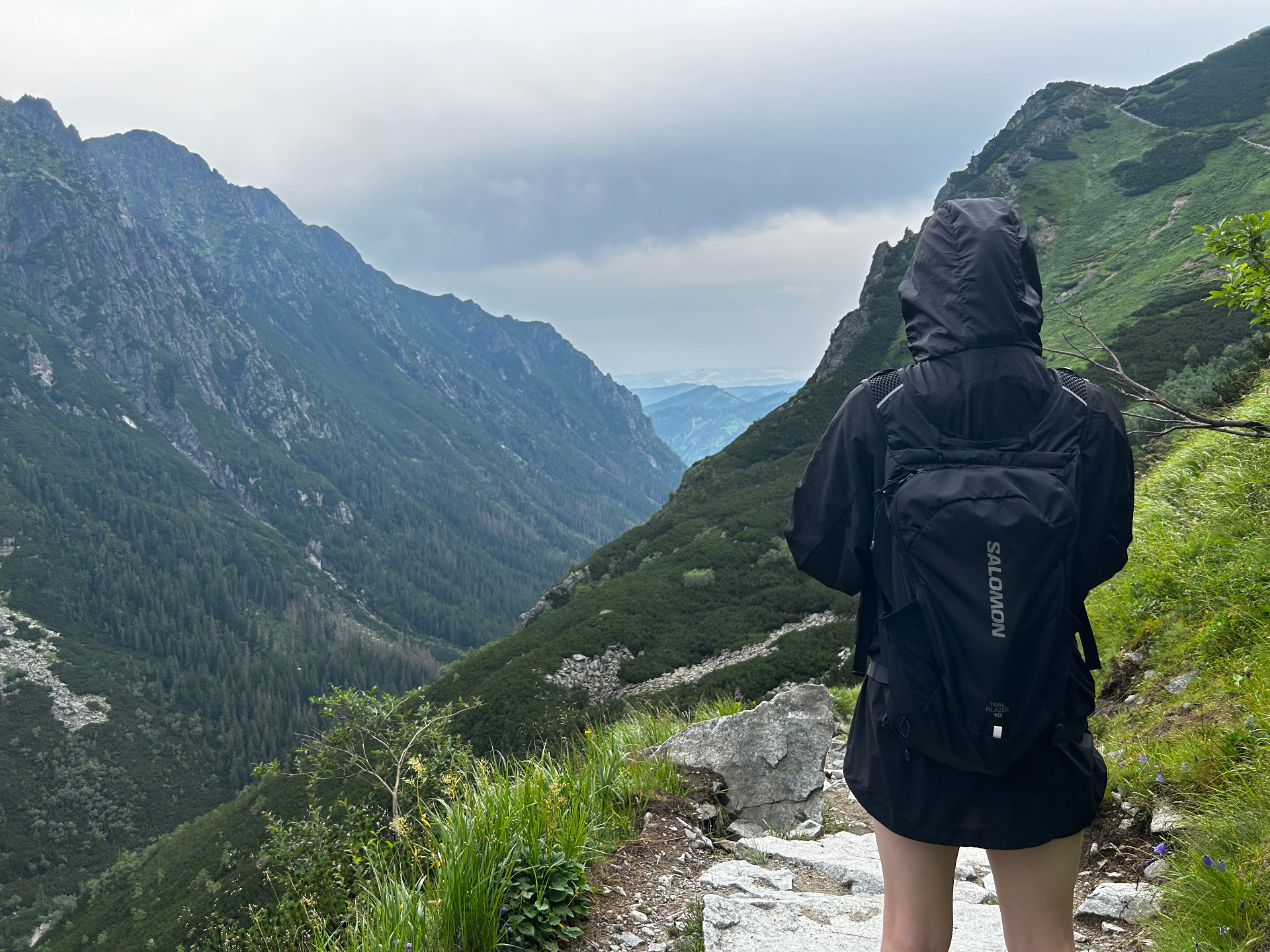 Overlooking the vast Tatra valley - a moment of contemplation on the mountain trail with dramatic views